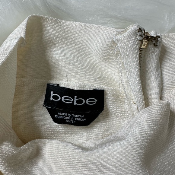 Bebe XS white bandage mini skirt with gold zipper - Picture 2 of 4